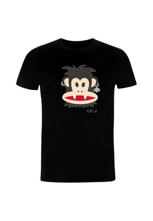 T-shirt en coton noir arborant un dessin de visage de singe cartoon avec des traits exagérés, des crocs et une boucle d'oreille en forme de chauve-souris. Lavable en machine.