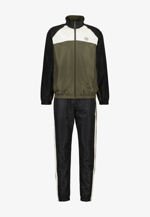 Trainingspak met een ritsjack in olijfgroen, zwart en witte panelen en bijpassende zwarte broek met witte zijstrepen. Zijdezachte textuur.