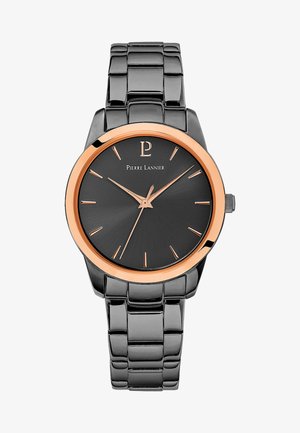 Schwarze Metalluhr mit einem verlängerten runden Gehäuse und einer roségoldenen Lünette, ausgestattet mit einem schwarzen strukturierten Zifferblatt und roségoldenen Stundenmarkierungen.