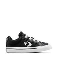 Zapatillas de lona negras con acentos blancos, con un diseño de estrella y flecha, punta redonda y cierre con cordones. Suela de goma con agarre texturizado.