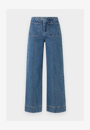 Blue high-waist wide-leg jeans with large front patch pockets, visible front seams, and a button closure at the waistband.