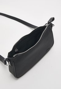 Lacoste Sac bandoulière - noir