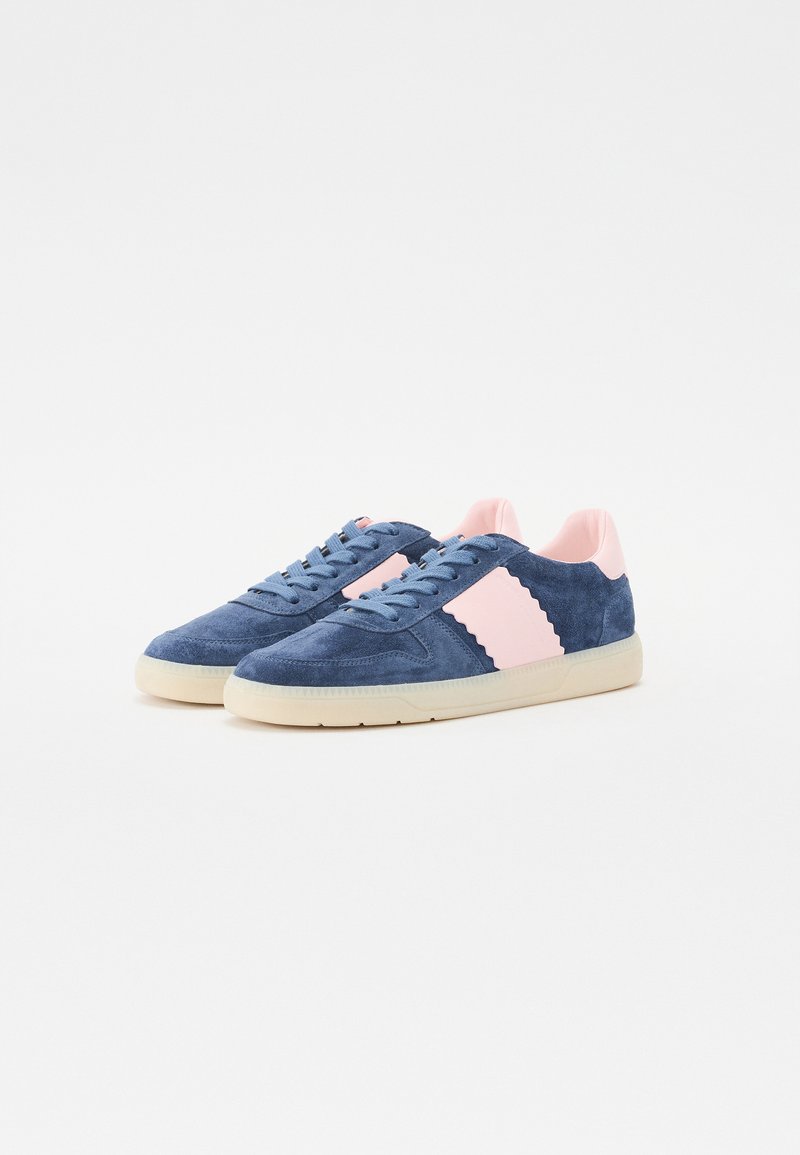 Blue suede sneakers with pink accents, featuring a lace-up design and textured details on the side. Cream rubber outsole.