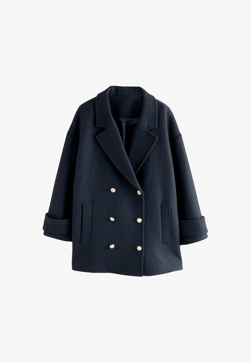 Sötétkék gyapjúkeverék peacoat, dupla soros gombolással, arany színű gombokkal, nagy hajtókákkal és oldalsó zsebekkel. Texturált felület.