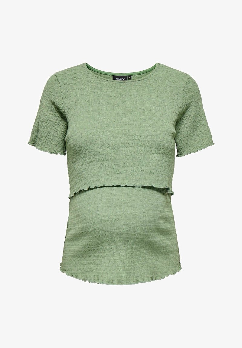 Top de maternidad verde claro, texturizado, con mangas cortas y un diseño cropped. Presenta un acabado suave y un dobladillo sin rematar.