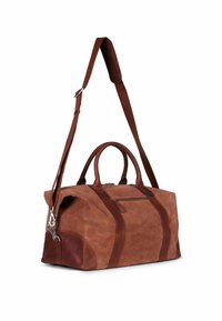 Ruskea nahkainen duffel-laukku, jossa on sileä pinta, kaksinkertaiset kantohihnat ja säädettävä olkahihna. Laukussa on edessä vetoketjullinen tasku ja korostusompeleet.