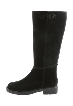 Black suede knee-high boot with a rounded toe, flat rubber sole, and side buckle detail. Features vertical stitching for texture.