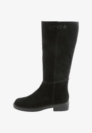 Black suede knee-high boot with a rounded toe, flat rubber sole, and side buckle detail. Features vertical stitching for texture.
