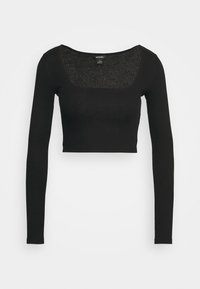 Musta pitkähihainen lyhyt toppi, jossa on leveä neliön muotoinen pääntie, istuva siluetti ja ribbikuvioinen kangas.