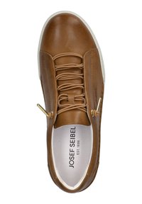 Brown leather sneaker with a smooth texture, featuring a rounded toe, lace-up design, and white rubber sole. Brand logo visible inside.