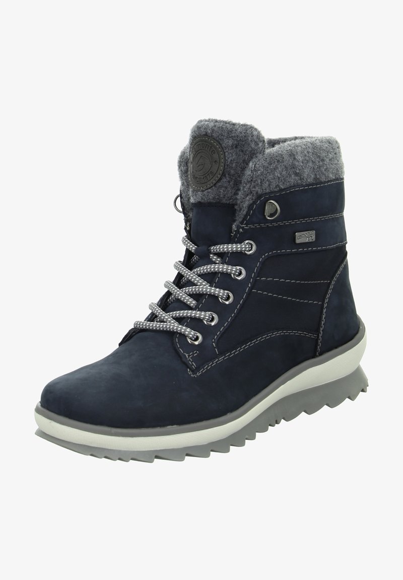 Botte d’hiver bleu marine avec col rembourré gris, lacets gris réfléchissants, semelle blanche, œillets métalliques et semelle extérieure texturée antidérapante.