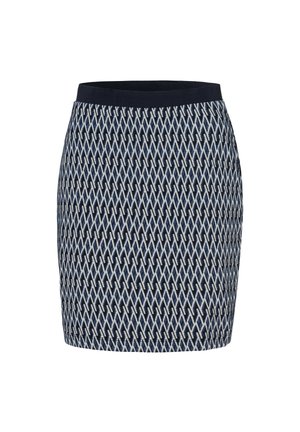 Jupe longueur genou avec ceinture bleu marine et motif en relief en losanges dans des tons de bleu, blanc et noir.