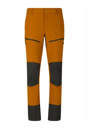 Ruosteenruskeat ulkohousut, joissa mustat vahvistetut polvi- ja sääriosat, sivutaskut vetoketjuilla reisillä ja kaksinappinen vyötärön sulkeminen.