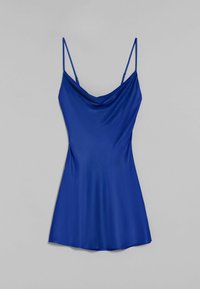Blue satin slip dress with thin adjustable spaghetti straps and a draped neckline on a neutral background.