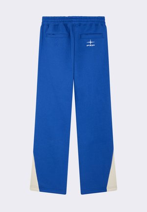 Blue sweatpants with a smooth texture, elastic waistband, two back pockets, and cream-colored accents at the ankles. Embroidered logos on back.