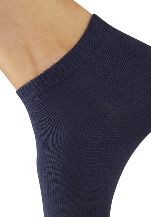 Navy ankle sock with ribbed texture and a snug cuff, made of a smooth, elastic fabric, highlighting a seamless design and clean edges.