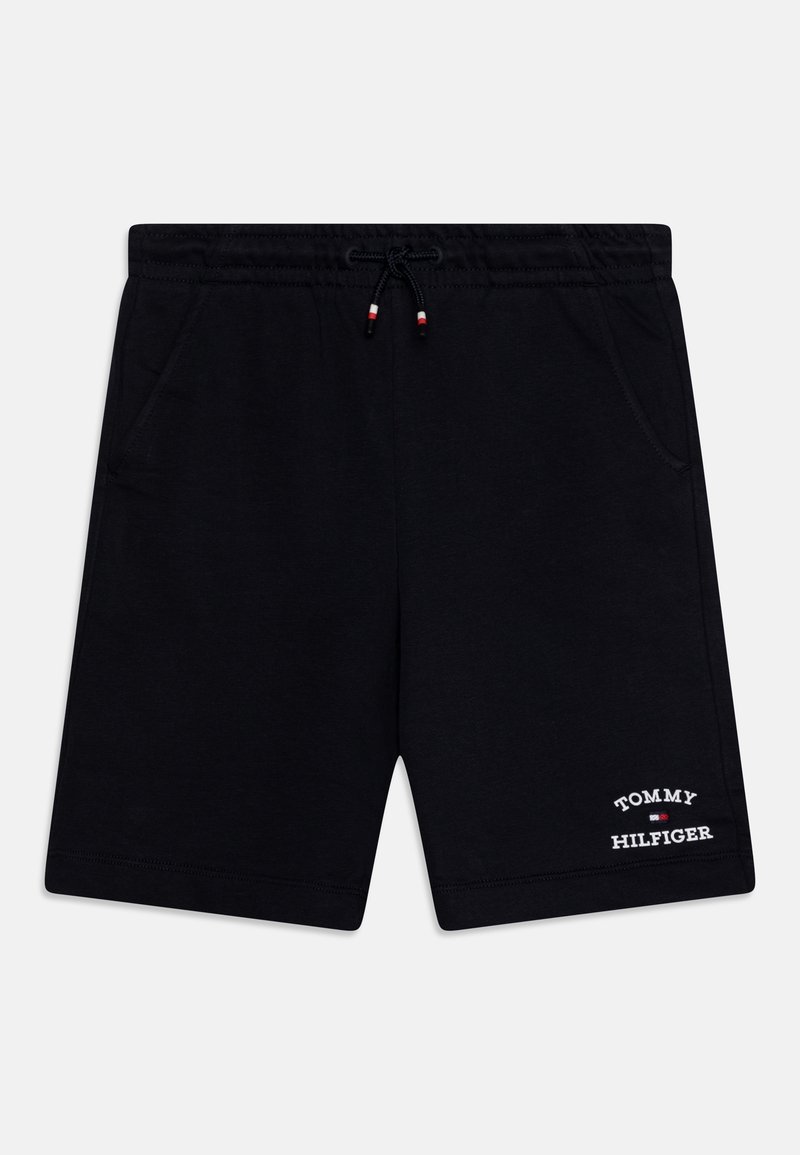 Shorts décontractés noirs avec taille à cordon et poches latérales, arborant le logo blanc "Tommy Hilfiger" et un petit drapeau en bas à gauche de la jambe.