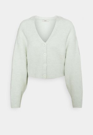 Světle zelený, žebrovaný, zkrácený cardigan s výstřihem do V a zapínáním na pět knoflíků. Dlouhé rukávy a měkká textura.