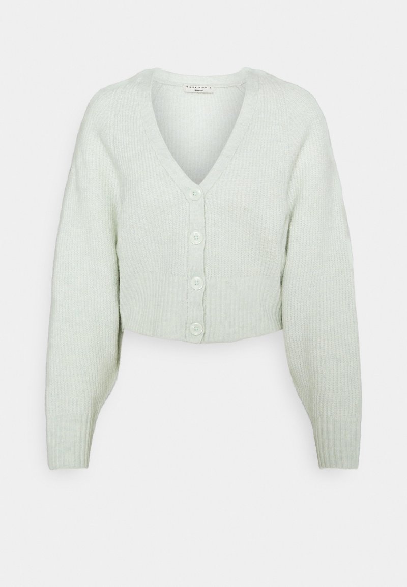Ljusgrön, rippad, kort cardigan med V-hals och knäppning med fem knappar. Långa ärmar och mjuk textur.