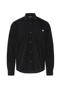 Musthave musta pikkade varrukatega kangast särk, millel on kaelus, esi-nupud, rinnanupuga tasku, millel on väike valge silt, ja nööbitegude mansetid.