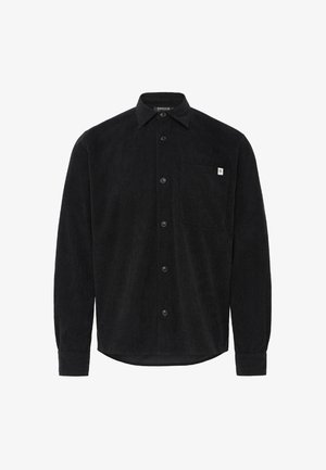 Musthave musta pikkade varrukatega kangast särk, millel on kaelus, esi-nupud, rinnanupuga tasku, millel on väike valge silt, ja nööbitegude mansetid.