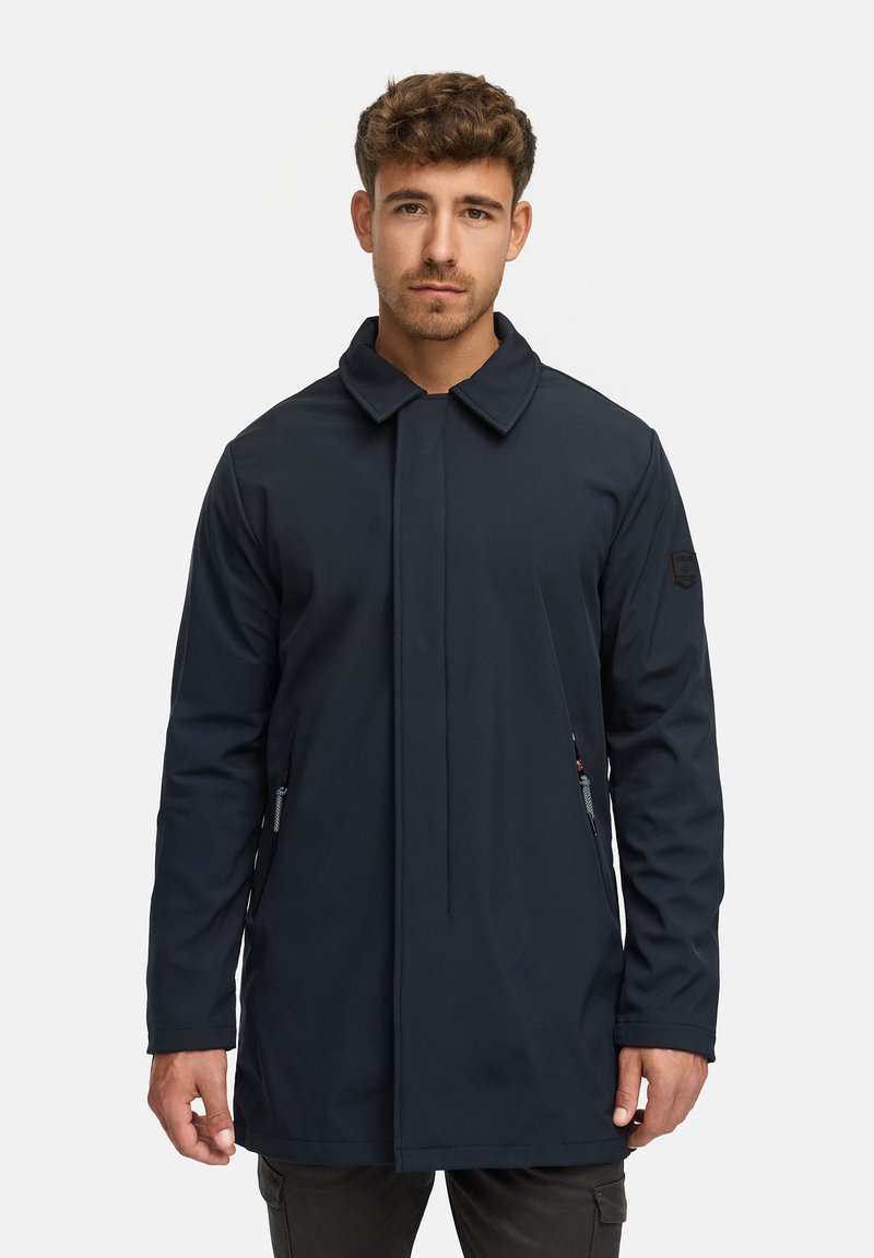 Dunkelblaue, langärmlige Jacke mit Kragen und Reißverschluss auf der Vorderseite, ausgestattet mit Seitentaschen und einem glatten, strukturierten Stoff.