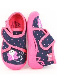 Navy blue children's shoes featuring pink accents, polka dots, and embroidered flower designs; adjustable Velcro straps and rubber soles.
