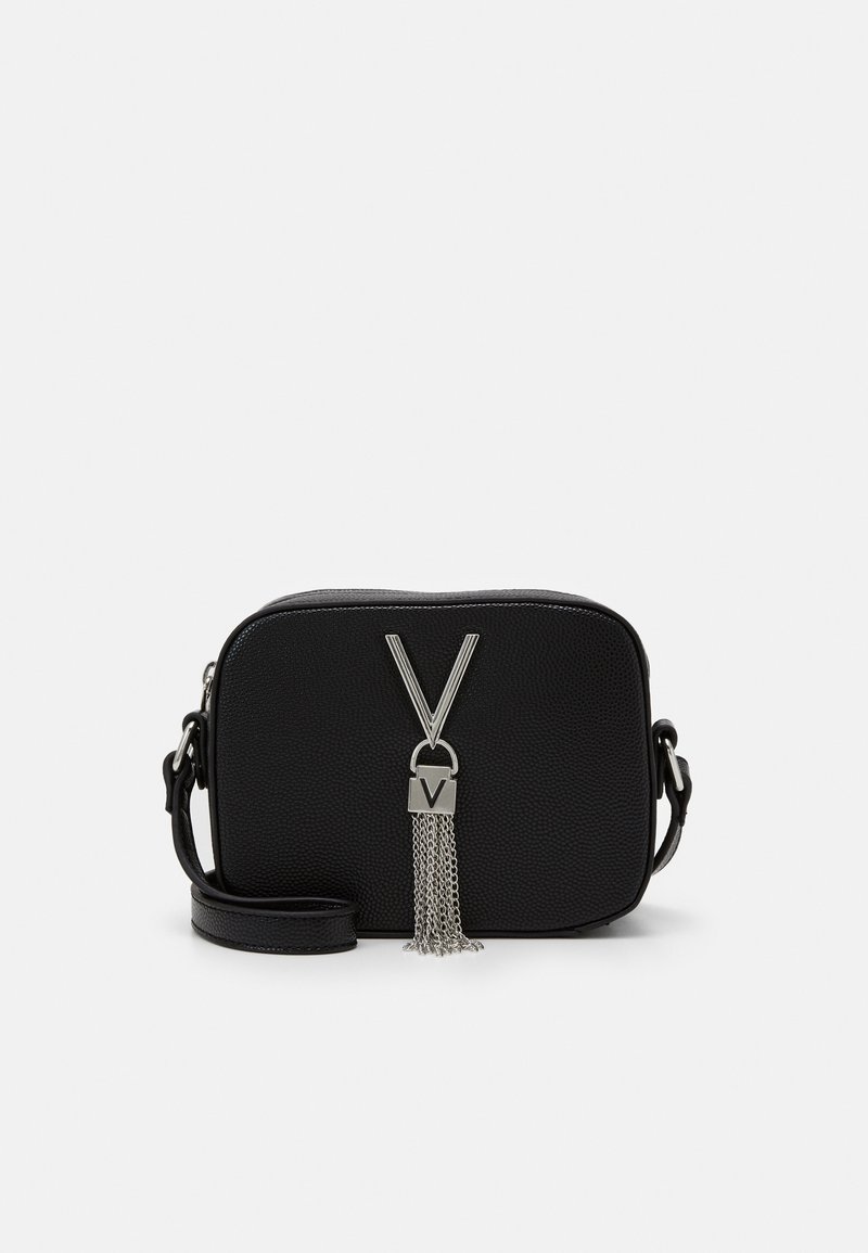 Black crossbody bag made of textured material, featuring a silver zipper with chain tassel detail and an adjustable strap.