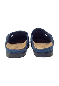 Scarpe slip-on blu in feltro con una morbida soletta color tan, design aperto sul retro e suole in gomma nera. Presentano cuciture lungo i bordi.