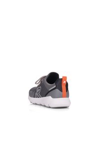 Gray athletic shoe with mesh upper, light gray accents, and a textured white sole. Features an orange pull tab and laces.