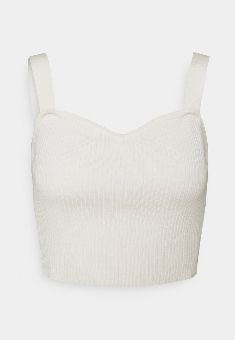 Crop top côtelé de couleur claire avec de larges bretelles et un décolleté en cœur. Texture lisse et design ajusté, idéal pour le superposition ou le port décontracté.