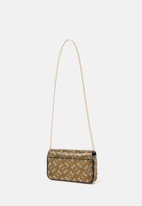 Golden patterned crossbody bag with chain strap, featuring a rectangular shape, smooth texture, and contrasting black trim.