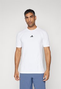 adidas Performance TENNIS PRO SEAMLESS AEROREADY FREELIFT - Camiseta deportiva - white