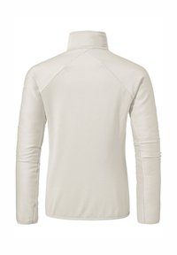 Leichter, cremefarbener Pullover mit hohem Kragen, strukturiertem Rippstoff und Raglanärmeln. Nahtdetails entlang der Arme.