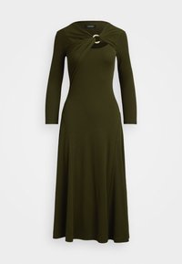 Olivgrön långärmad klänning med en twist-detalj vid halsringningen och en cirkulär accent. Tillverkad av mjukt, stretchigt tyg med en A-linjeform.