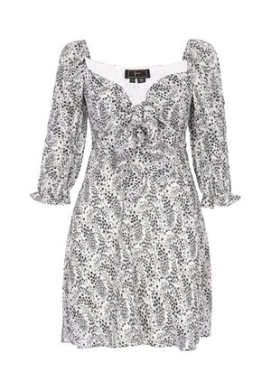 Hvid kjole med sort blomstermønster, puffede lange ærmer, knyttedetalje foran og figursyet talje i et letvægtsstof.