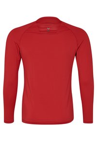 Rød langærmet skjorte lavet af letvægtsstof. Har et tætsiddende design med en sømløs ryg og rund halsudskæring. Tekstureret detaljering ved skuldrene.