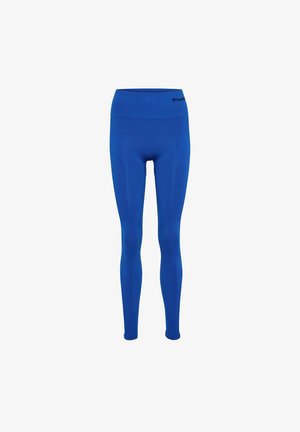 Blaue Leggings mit hohem Bund, hergestellt aus einem glatten, dehnbaren Stoff. Verfügt über subtile Texturdetails entlang der Beine.