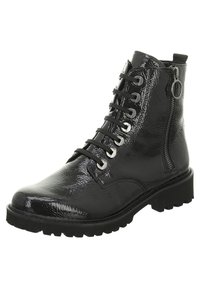 Bottines noires en cuir verni brillant, dotées d'un laçage à l'avant, d'une fermeture éclair latérale et d'une semelle robuste avec un profil prononcé.