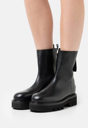 RITA MID BOOT ZIP - Platform ankle boots - nero