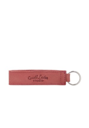 Rectangular dusty pink suede leather keychain with "Gusti Leder studio" stamped and a silver metal keyring attached.