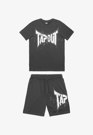 Black cotton t-shirt and shorts set featuring a large white "TAPOUT" graphic with a distressed effect. Elastic waistband on shorts.