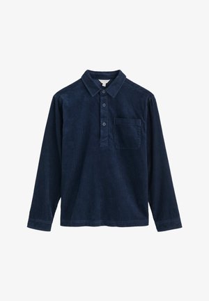 Camicia a maniche lunghe in corduroy blu navy con colletto, placca a tre bottoni e tasca sul petto. Presenta una texture a coste e un orlo dritto.