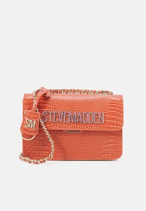Orange croc-embossed leather crossbody bag with gold chain strap and "STEVE MADDEN" logo on the flap and "SM" tag attached.