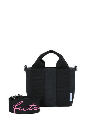 Black fabric tote bag with short handles and a detachable strap. Features contrasting pink text on the strap. Compact rectangular shape.