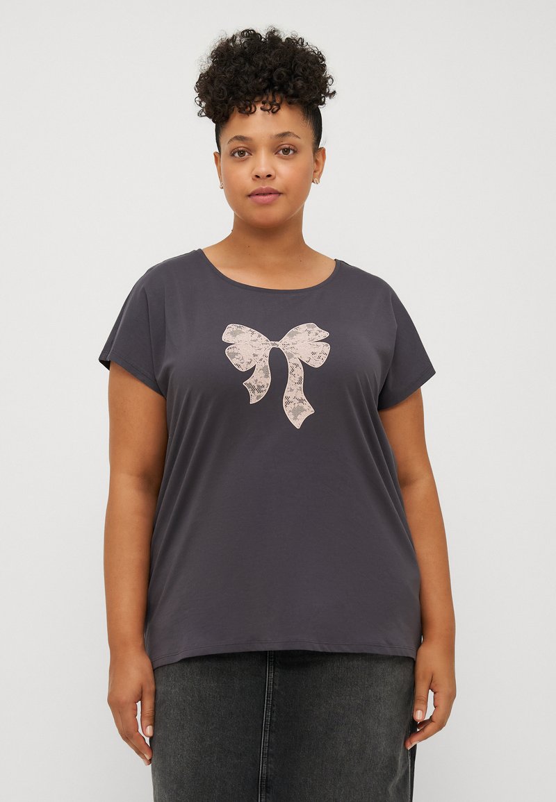 Dark gray short-sleeve t-shirt with a round neckline and a textured light pink bow graphic at the center. Soft fabric, relaxed fit.