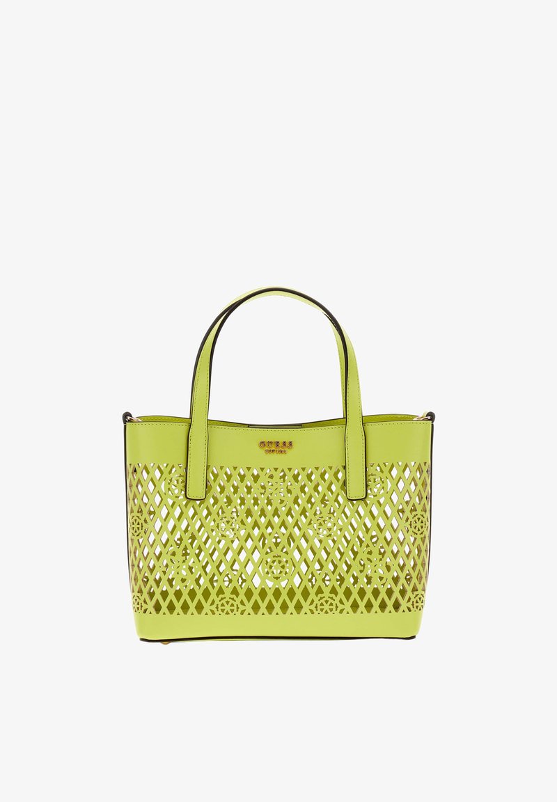 Sac cabas vert citron avec doubles anses, motif ajouré à treillis et floral, et logo doré "GUESS" au centre avant supérieur.