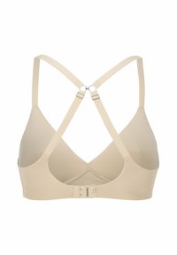 Beige trådlös bh med en slät yta, korskorsade axelband och en hyskknäppning på baksidan. Enkel design utan utsmyckningar.