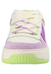 White sneaker with purple and green accents, featuring textured suede and smooth leather, round laces, and a patterned outsole in green.