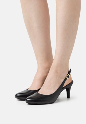 Escarpins noir à bride arrière avec un bout pointu, en cuir lisse, dotés d'une petite boucle dorée et d'un talon fin.